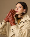 Cognac brown goatskin leather gloves with smooth finish and stitched finger lines