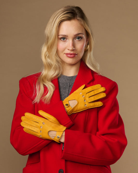 Yellow lambskin driving gloves with perforations and touchscreen fingertips