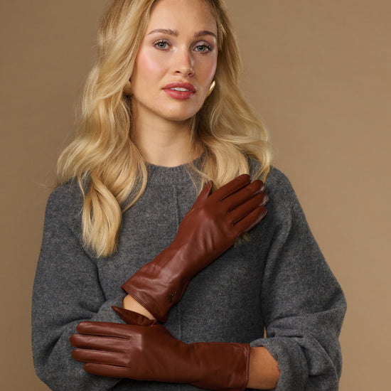 Extra-long cognac leather gloves with stitched wrist and hand-seam panels