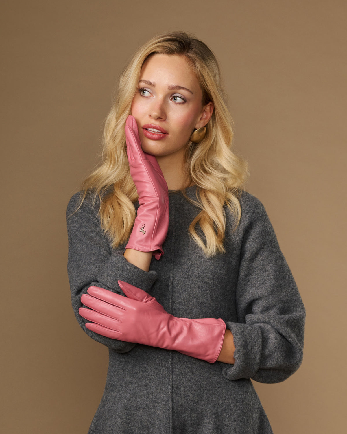 Pink leather gloves with long cuffs, curved thumb, touchscreen fingertips