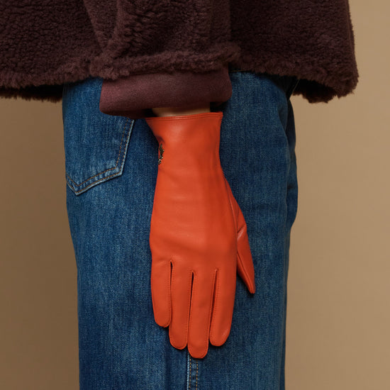 Lauren orange lambskin leather glove with touchscreen tip, silk-lined, hanging cuff