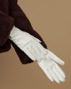 White sheepskin leather gloves with fleece lining, long cuff and stitched fingers