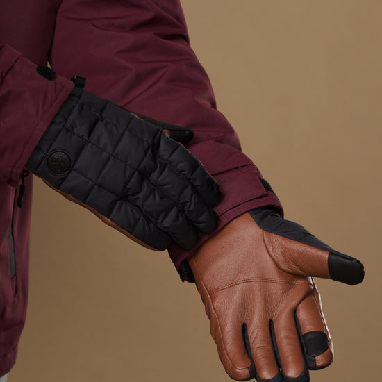 Men's quilted touchscreen gloves with brown palm panel and dark cuff