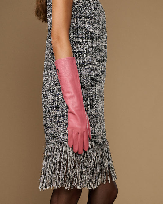 Pink below-elbow leather glove pair, fitted fingers and cuffs, hand held down