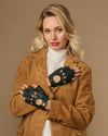 Dark green fingerless lambskin driving gloves with snap-close wrist strap