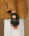Dark green fingerless lambskin driving gloves, cuff buttons and open palm style